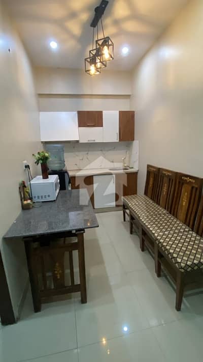 Fully Furnished studio Apartment For Rent  2 Bed with Attached Bathrooms Kitchen Appliances Installed 4Th Floor Neat & Clean Stairs location: Muslim Commercial DHA PHASE-6 Only for long-term For more details and viewing, please contact: