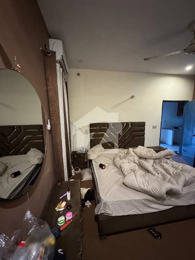 5 Marla 2nd Floor For Rent Opposite Emporium Mall For Rent Suitable for (Females Or Small Family)