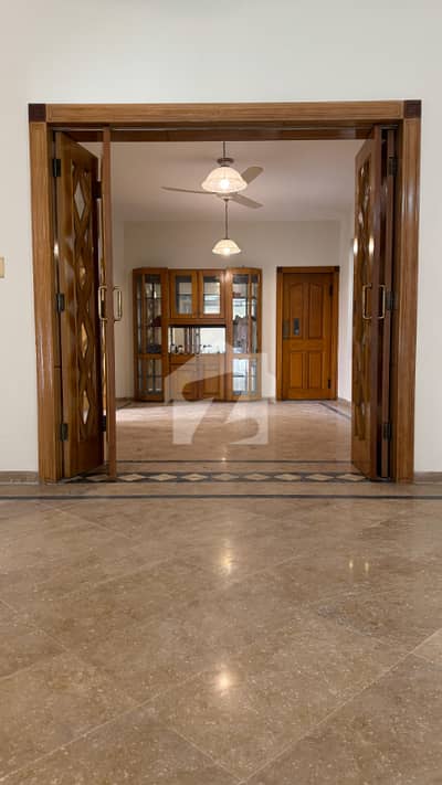 F-8 Excellent Double Storey House Spacious 1 Kanal House Proper 5 Bedrooms, 5 Attached Bathrooms Modern Fittings Along With Marble Flooring Drawing Dining, TV Lounge, Kitchen