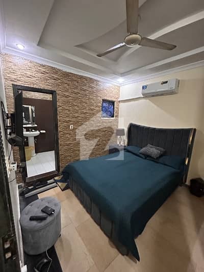 frinshed 2bed flat for rent good location near G. T road walleyt complex bahira town phase 7
