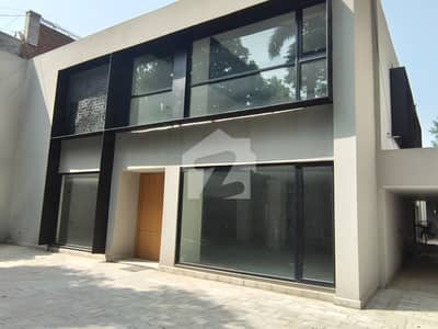 GULBERG ESTATE OFFER,6000 SQFT COMMERCIAL BUILDING FOR RENT MAIN BOULEVARD & MM ALAM ROAD GULBERG LAHORE