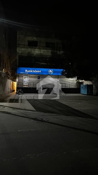 20 MARLA COMMERCIAL BUILDING FOR SALE BASEMENT WITH 3 STORY LDA LIFE TIME COMMERCIAL PAID MAIN COLLEGE ROAD LAHORE