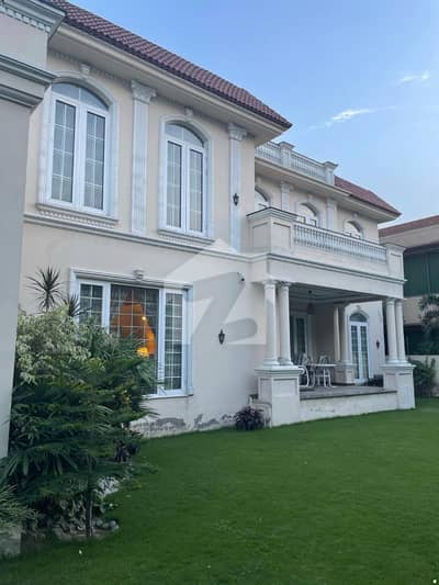 2 Kanal Spacious Designer Bungalow For Sale In DHA Phase 5 Lahore Full Basement, 7 Bedrooms, 3 Kitchens, Two-Side Open, Faisal Rasool Design, Near Penta Square & Park