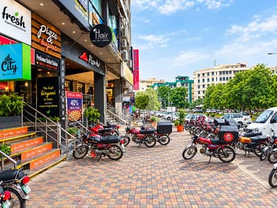 1,000 Sq. Ft. Commercial Shop Is Available For Rent In F-11 Markaz, Islamabad, Located Directly On The Main Double Road In A Prime And Highly Visible Commercial Location.