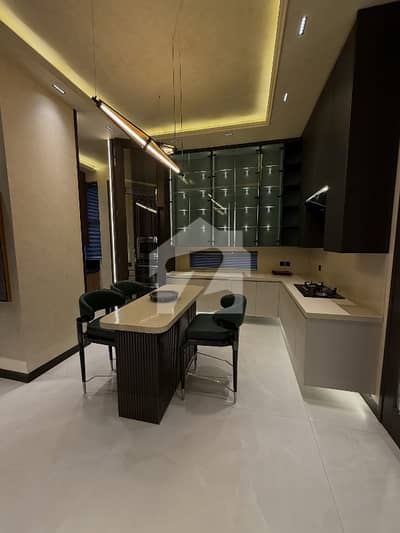 One Kanal Brand New luxury Modern design Fully Furnished Full basement House Available For Rent in DHA Phase 6 Hot Location