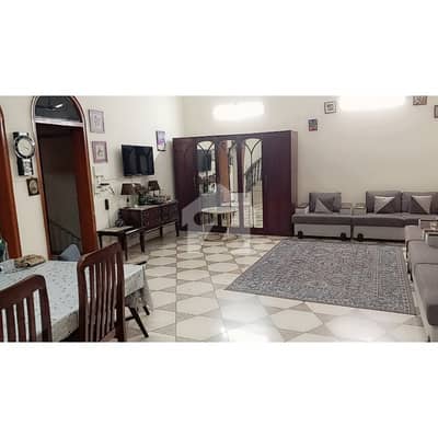 Beautiful & Solidly Built With Large Green Lawn And Open Basment 511 Sq. Yards House For Sale In F-10, Islamabad