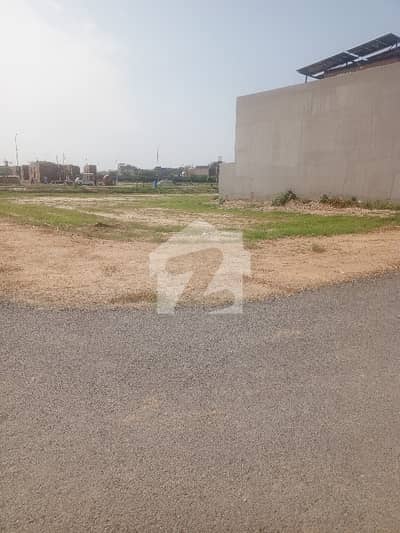 10 m plot for sale corner paid extra land not paid near mean road all due paid  near park comm masjid school