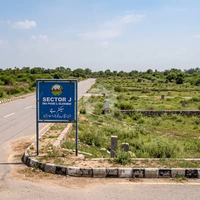 Prime Investment Opportunity: 1 Kanal Plot on 80ft Main Road | Sector J, DHA Phase 3
