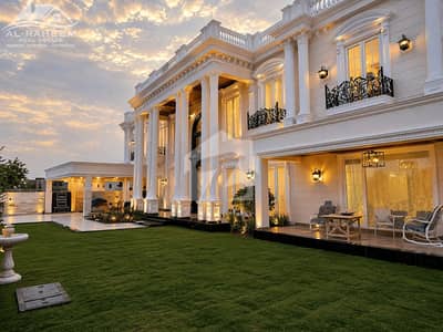 2 KANAL ORIGINAL FAISAL RASOOL SPANISH DESIGN BANGALOW WITH BEAUTIFUL LAWN FOR SALE NEAR TO PARK.