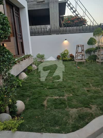 LIVE THE LUXURY YOU DESERVE! | EXQUISITE 5-BEDROOM BUNGALOW WITH HALF BASEMENT | DHA PHASE 8 |