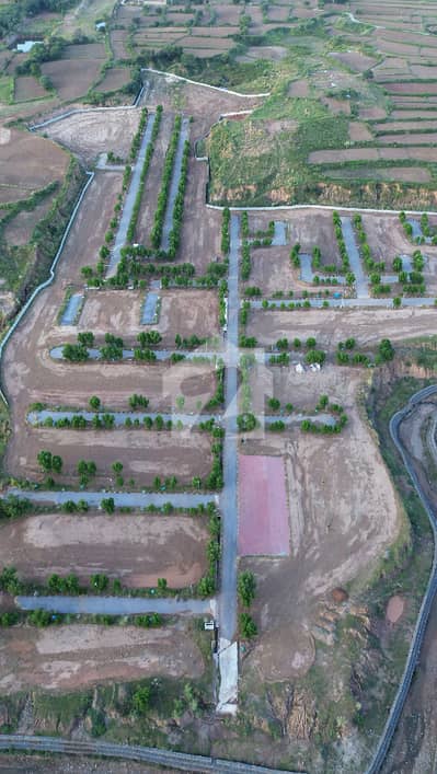 LILLY A BLOCL 4 MARLA COMMERCIAL READY PLOT WITH CONSTRUCTION LETTER ALL DUES CLEAR