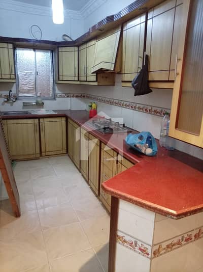 Flat sale 2 bed d d attached Tile Fahad garden Gulshan 13d2 Ground floor Boundrywall Lease 76 lac final Dmd 80lac *Code(16920)*