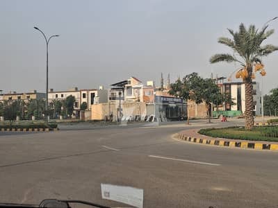 8 Marla Commercial overseas block main 150 ft road for sale in 1 year instalment