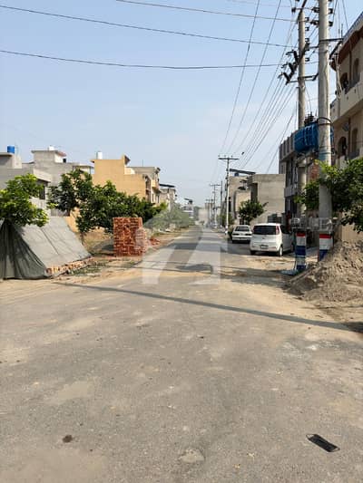 3.5 Marla Residential Plot in a Prime Location Surrounded by Houses