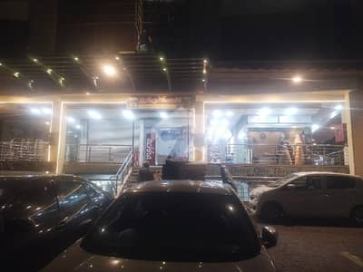3 Sides Corner Shop facing Road for Sale in Main Market Gulberg