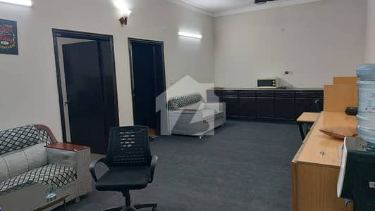 12 MARLA FACING PARK PORTION AVAILABLE FOR RENT FOR OFFICE .