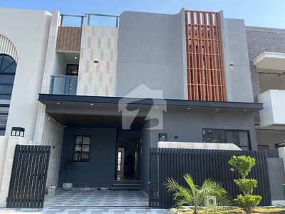 7 Marla Beautiful House for Sale in E Block B-17 Islamabad on Main Road with Basement Room