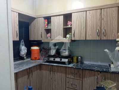 2 Bed Lounge Corner Flat for Sale | First Floor | Prime Location of Block 12, Gulistan-e-Johar | No Electricity or Water Issues | 2% Commission Applicable | Pics Are for Reference Only | Contact Fair Deal Associates for Details.