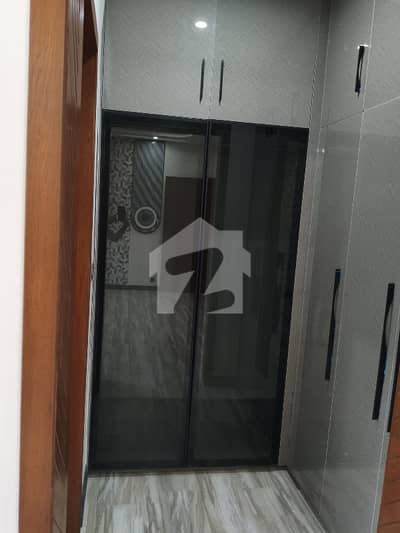 One Kanal Brand New House having 3 bedrooms along with attached bathrooms, drawing, dining, kitchen, grease kitchen, store room on ground floor and same set up on first floor Mumty having a room and attached bathroom