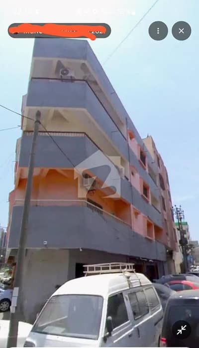 200YARDS BUILDING FOR SALE CORNER WITH RENTAL INCOME 4.5 LACS