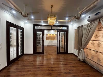1 KANAL ELEGANT AND FULLY MAINTAINED SPANISH BUNGALOW WITH 10 ACs AND CURTAIN INSTALLED IS AVAILABLE IN THE BEST BLOCK OF DHA LAHORE.