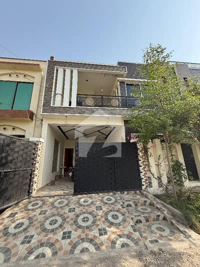 5 Marla Brand New House For Sale Mujahid Green Valley Multan  . . . . . . Prime Location. . . . . .   Mujahid Green Valley   Park Facing