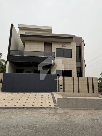 10 Marla Beautiful House for Sale  A beautifully designed 10 Marla house is available for sale in a prime location. The property features spacious bedrooms, attached bathrooms, a stylish TV lounge, a modern kitchen, a comfortable drawing room, and a car p