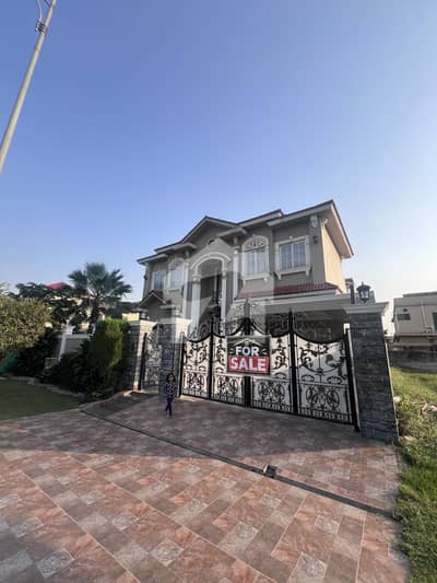 1 Kanal Slightly Used Well Maintained House For Sale in Dha Phase 6 Hot Location 70Ft Road