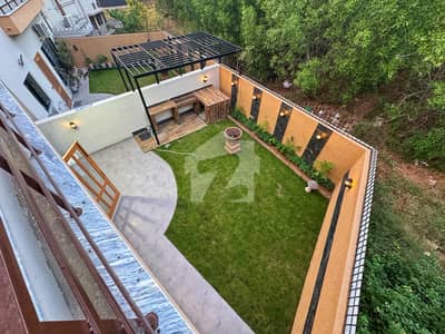 Beautiful Lawn 11.5 Marla Brand New Designer House for Sale in Bahria Town Ph 8 Khalid Block Beautiful Lawn 11.5 Marla Brand New Designer House for Sale in Bahria Town Ph 8 Khalid Block