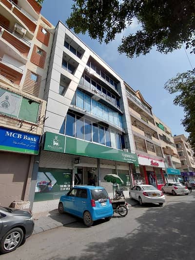 Luxury Semi Furnished Office Available For Sale Best Deal Future Investment 1050 Sqaure Feet Main Khayaban E Rahat SKBZ College Ground Facing Gound Starting To Lift 2 Washroom 1 Kitchen Ready To Move Office 24/7 Sweet Water Plus Guard Glass Elevation Building Viewing And Other Detail Call Now