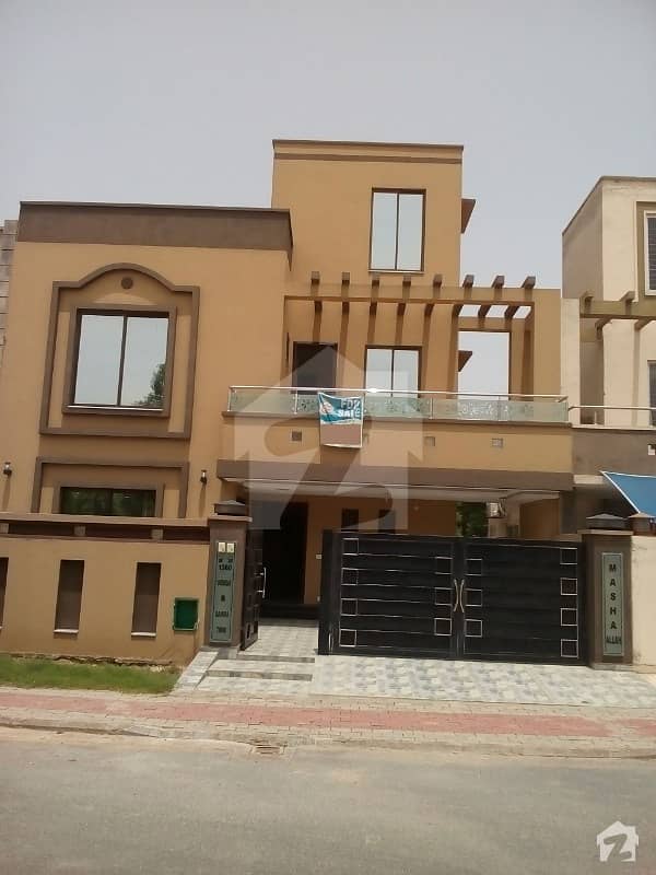 10 Marla House Available At Very Beautiful Location In Overseas B Bahria Town Lahore
