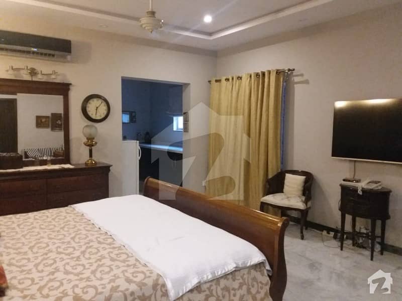 2 Single Furnished rooms with new attached Tiled bath opposite to Park in DHA phase 4