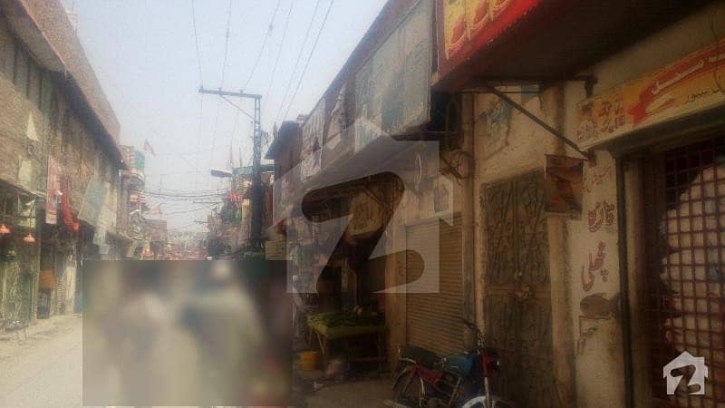 10 Marla House With 8 Shops Afghan Colony Peshawar