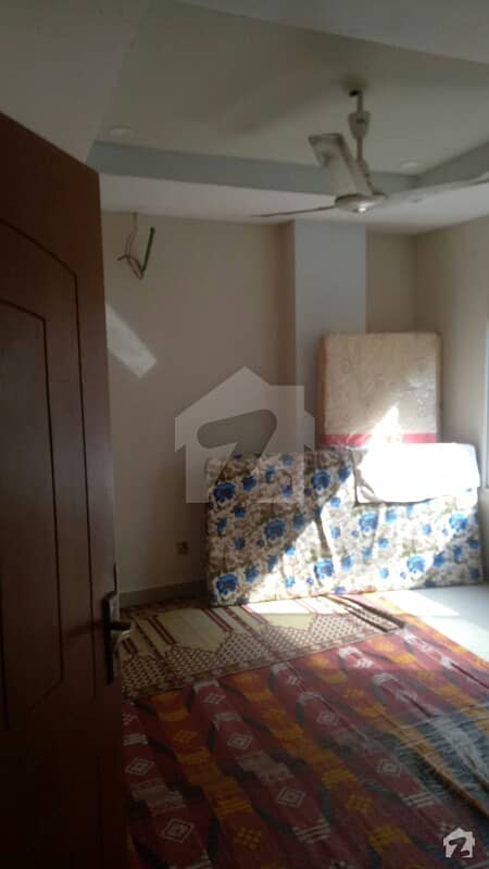 Bahria apartment 2 bedrooms attached bath n living room for rent. 