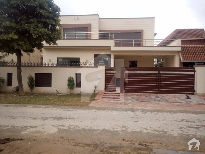 1 Kanal Brand New Bungalow With Facing Park In DHA Phase 4