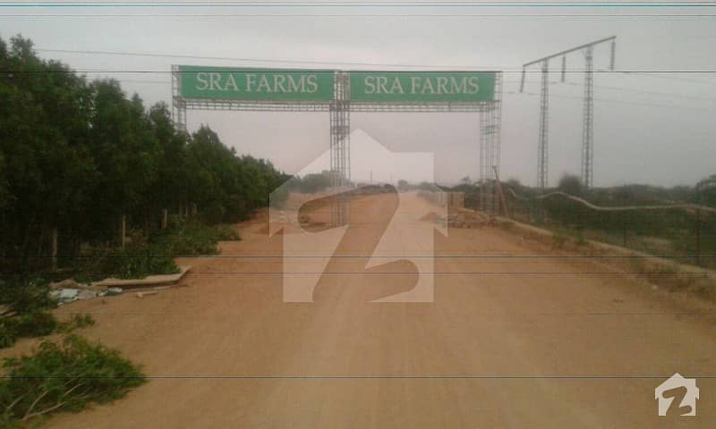 FARM HOUSES PLOTS Land on installments in a Gated Project near DHA City Super Highway