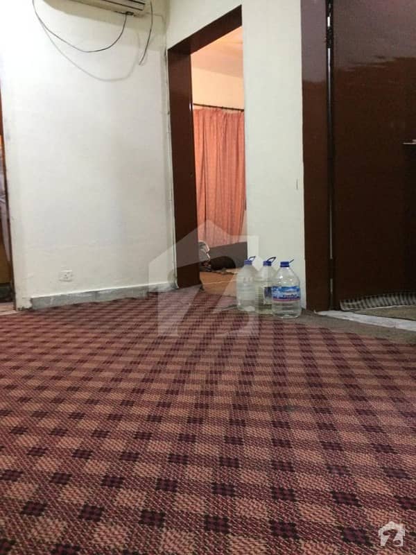 carpeted room with attach bathroom tv lounge carpeted room with attach bathroom tv lounge