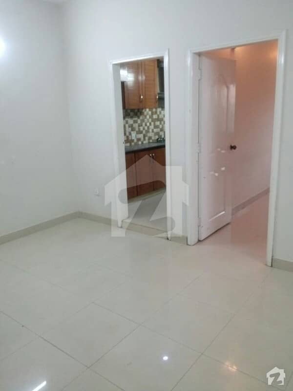 APARTMENT IS AVAILABLE FOR SEL IN BUKHARI COMMERCIAL 1ST FLOOR 2BEDROOM 950 SQUARE FEET