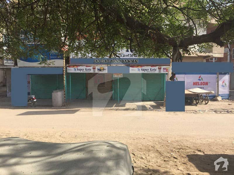 200 Sq Yard Commercial House With Shops For Bank And Builders Main Road Facing Nazimabad Under Bypass - For Sale