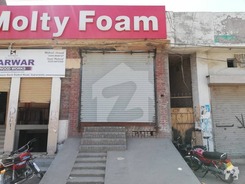Commercial Shop And Back Side Double Storey Hall Pluse Basement Is Available