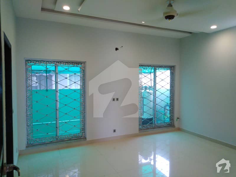 10 Marla Outclass House Available For Rent in DHA Phase 8 with 4 Beds