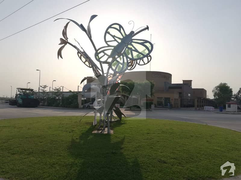 11 MARLA IDEALLY LOCATED MAIN BOULEVARD POSSESSION PAID PLOT FOR SALE IN TIPU SULTAN BLOCK DECTOR F BAHRIA TOWN LAHORE