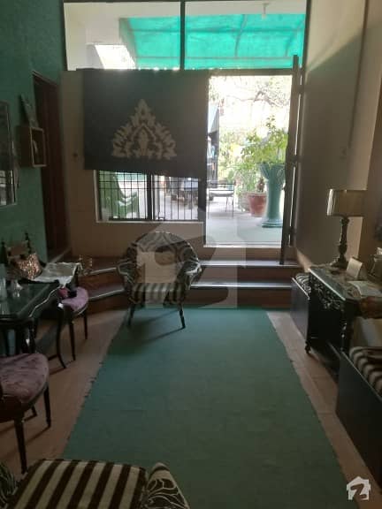 Kanal Single Storey House For Sale In Gulberg Main Market Lahore.