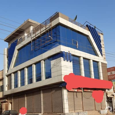 Triple Storey Beautiful Corner Commercial Plaza's Ground Floor Available For Rent At GT Road Khalid Town Okara