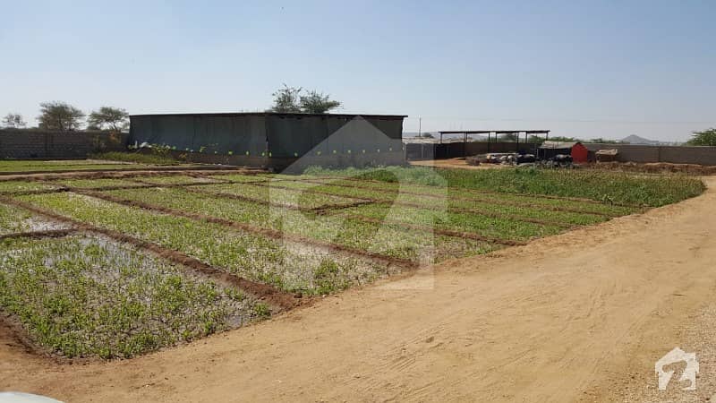 Farm Houses Plots Land on installments in a Gated Project Super Highway Karachi Pakistan