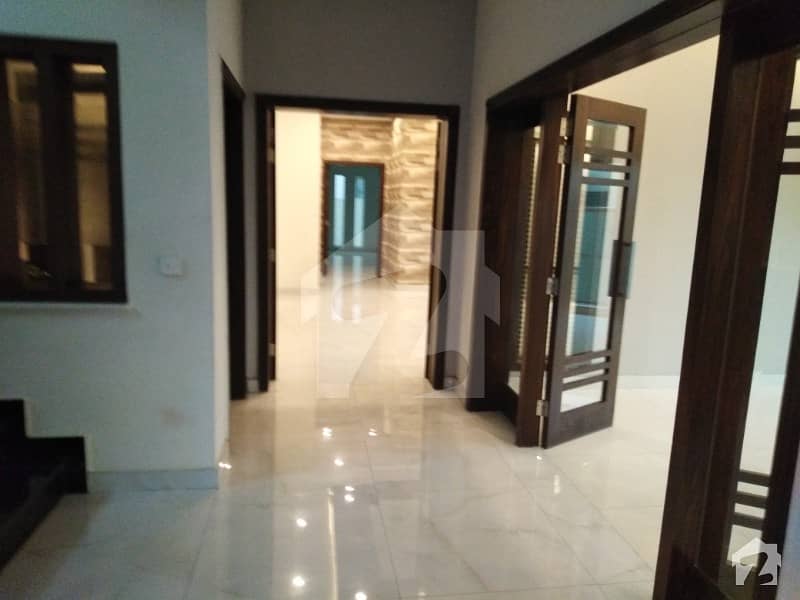 Having 5 Luxury Master Size Bedroom with Attach Tiled Tub Bathroom beautiful Company Kitchen  T v Lounge Drawing  Dining Aluminum windows  fully Marble flooring Car Porch store Room Beautiful Graphic Powder Room Intercom Beautiful front main Gate Near to 