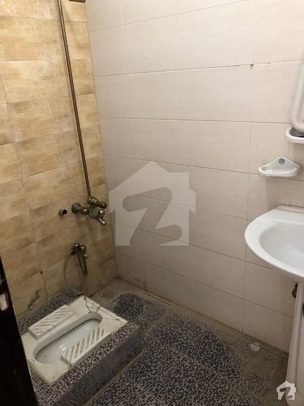 Tile Flooring Room With Attached Barth Room On Prime Location Very Reasonable Rent