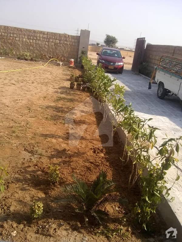 Farm Houses Plots Land on installments in a Gated Boundary Super Highway Karachi