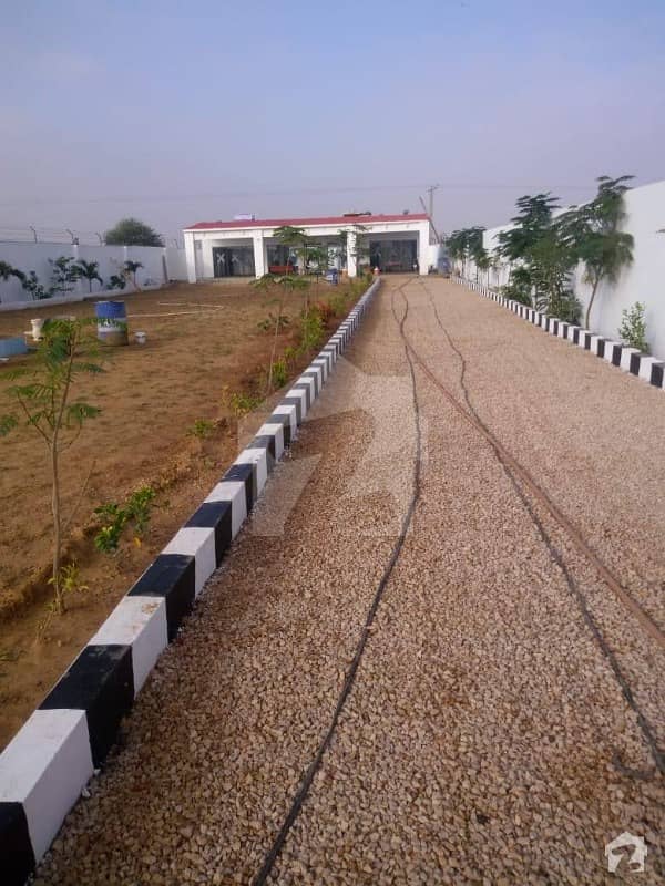 FARM HOUSES PLOTS Land on installments on main Super Highway Karachi Pakistan