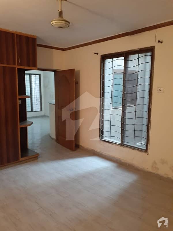 family flat in super town main DHA road. 2 bed's TV kitchen fully Marble